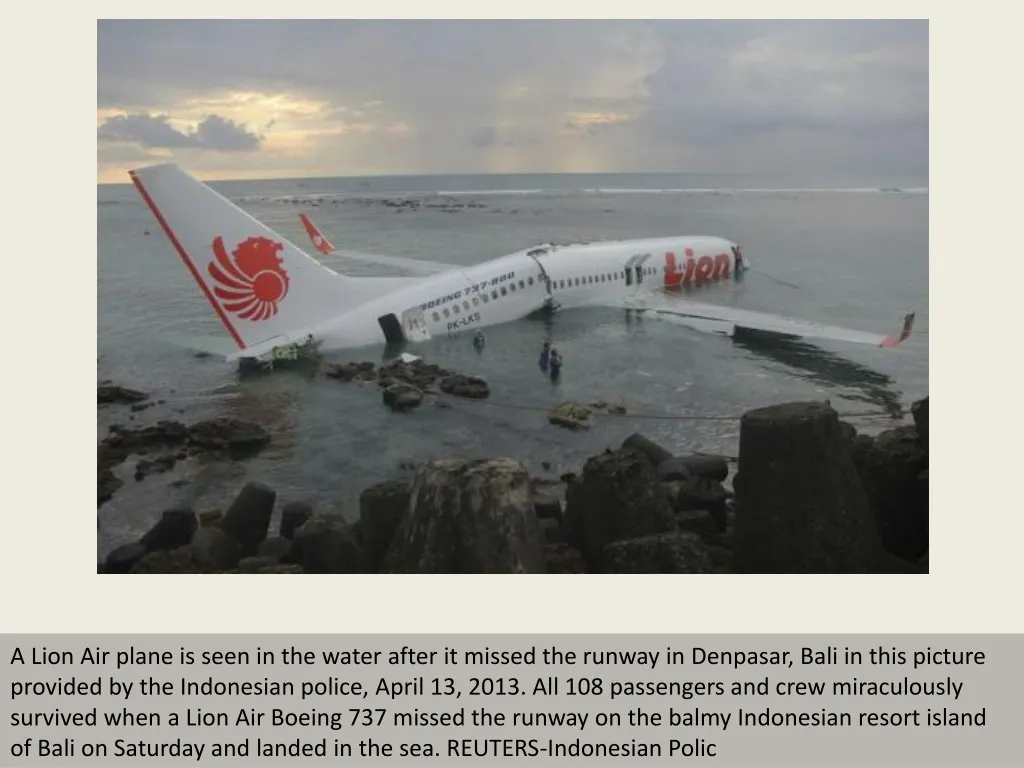 a lion air plane is seen in the water after