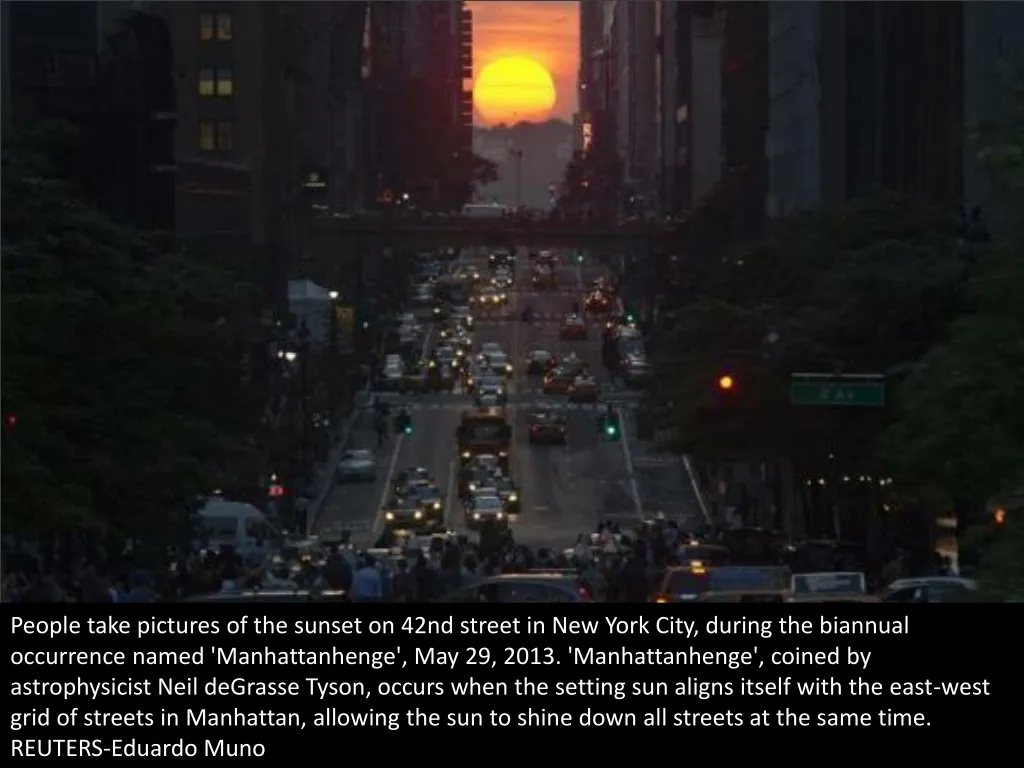 people take pictures of the sunset on 42nd street