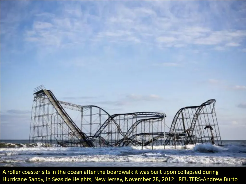 a roller coaster sits in the ocean after
