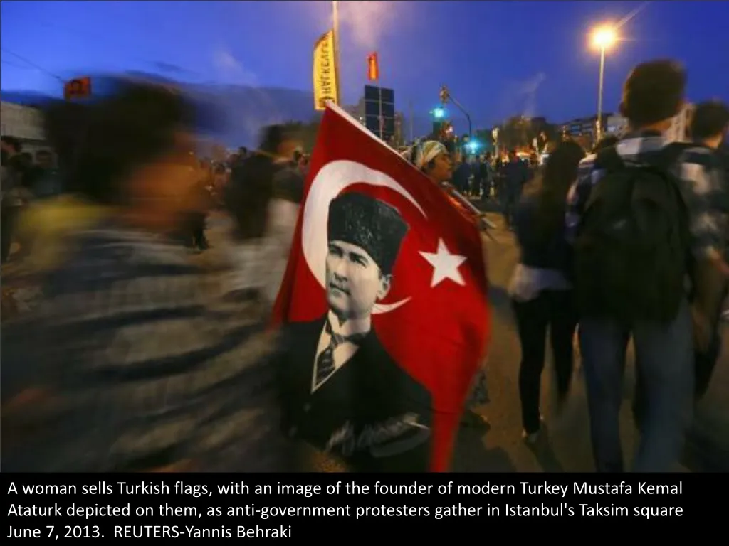 a woman sells turkish flags with an image