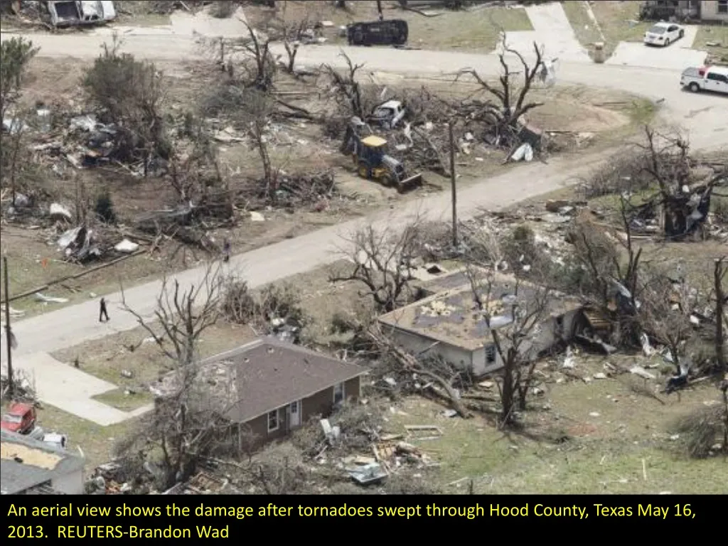 an aerial view shows the damage after tornadoes