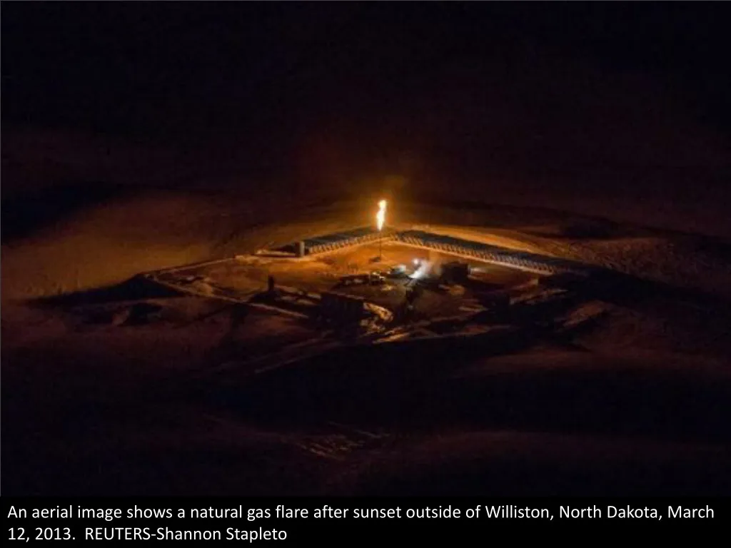 an aerial image shows a natural gas flare after