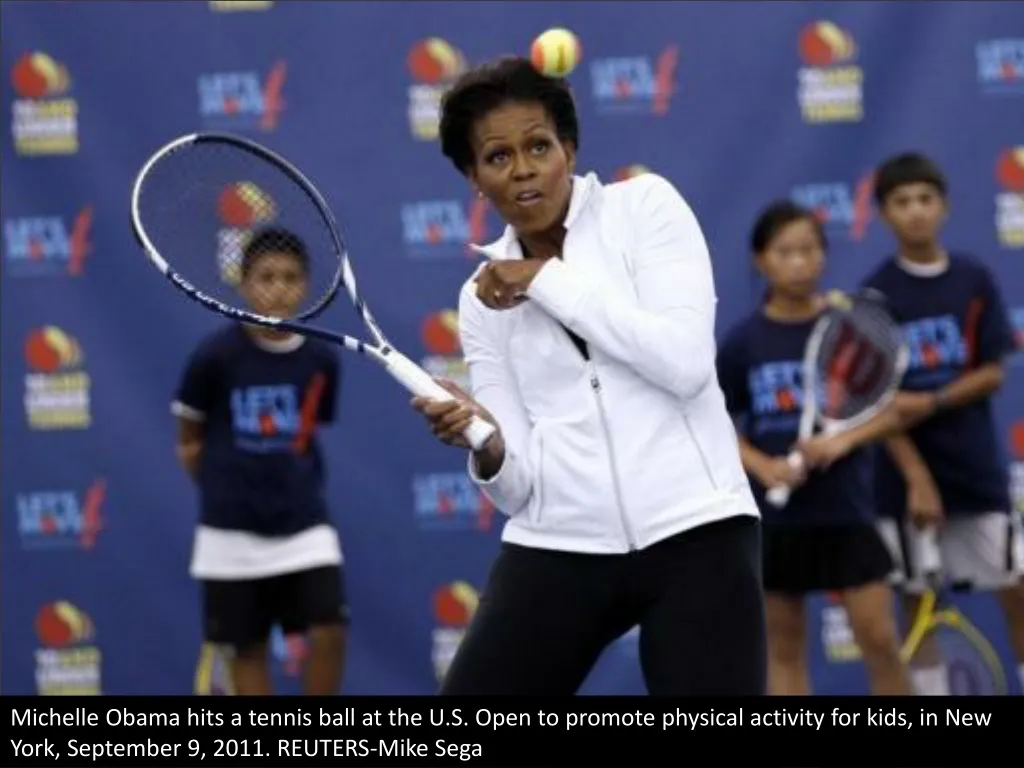 michelle obama hits a tennis ball at the u s open