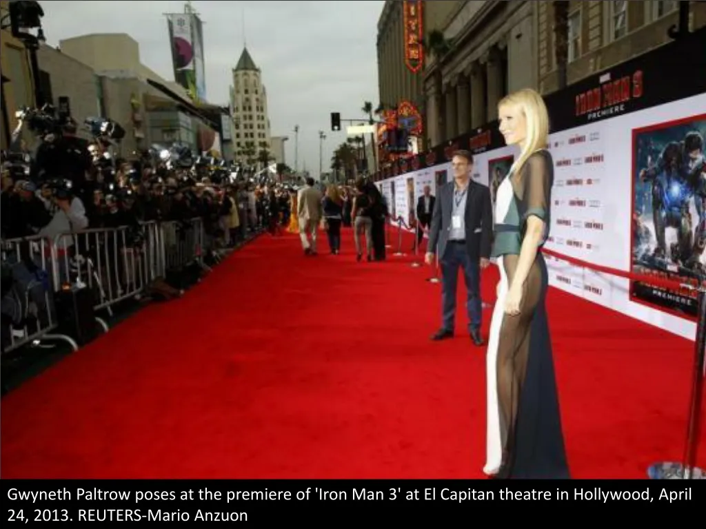 gwyneth paltrow poses at the premiere of iron