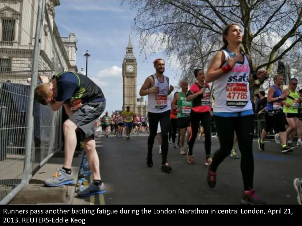 runners pass another battling fatigue during