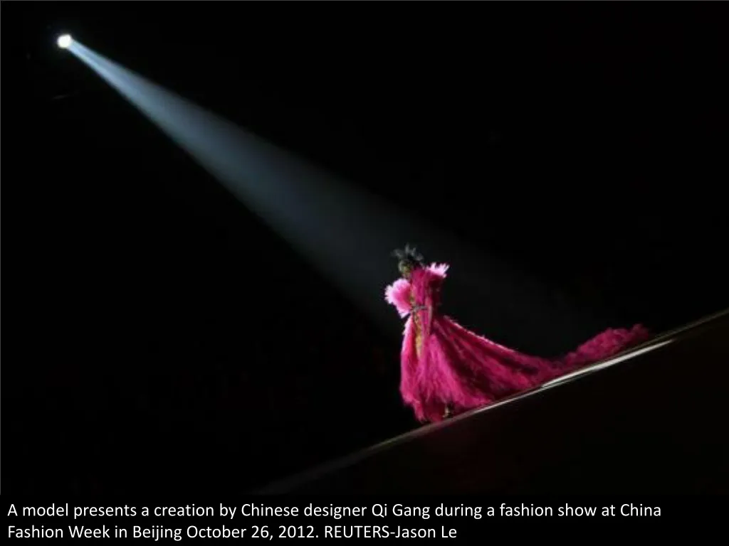 a model presents a creation by chinese designer