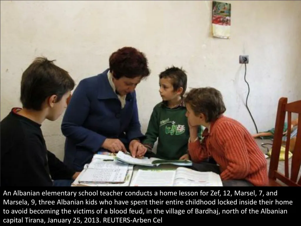 an albanian elementary school teacher conducts