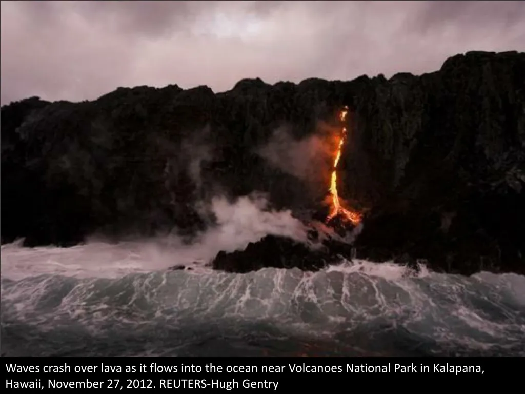 waves crash over lava as it flows into the ocean