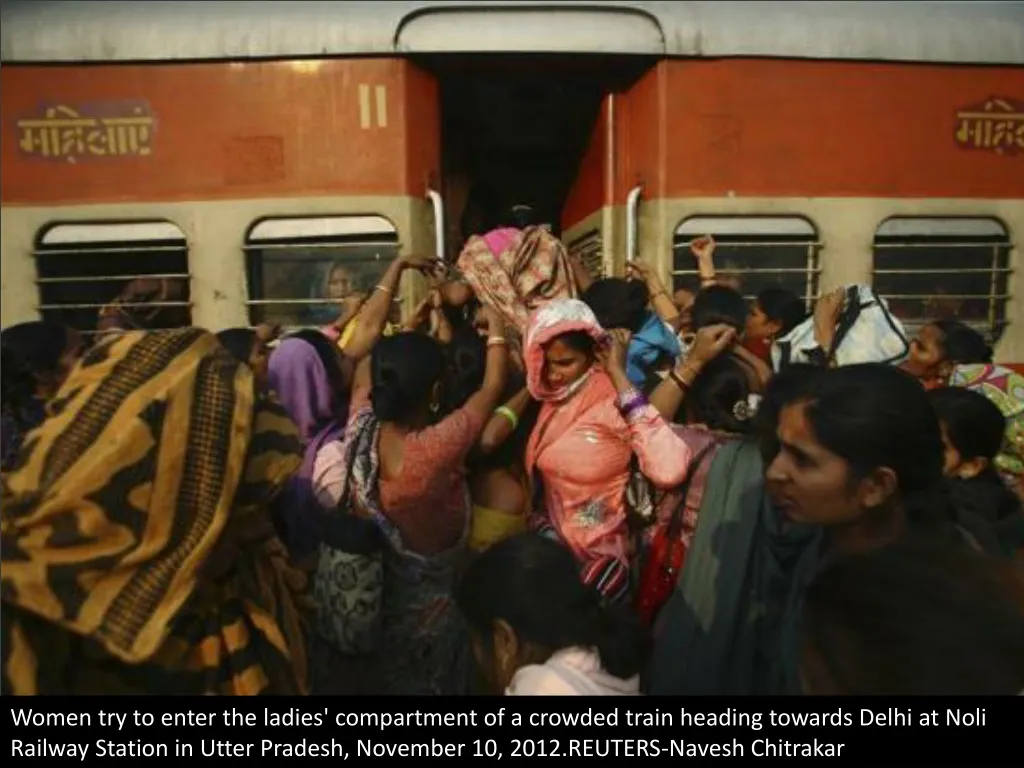 women try to enter the ladies compartment