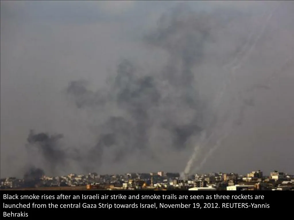 black smoke rises after an israeli air strike