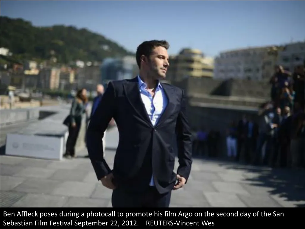 ben affleck poses during a photocall to promote