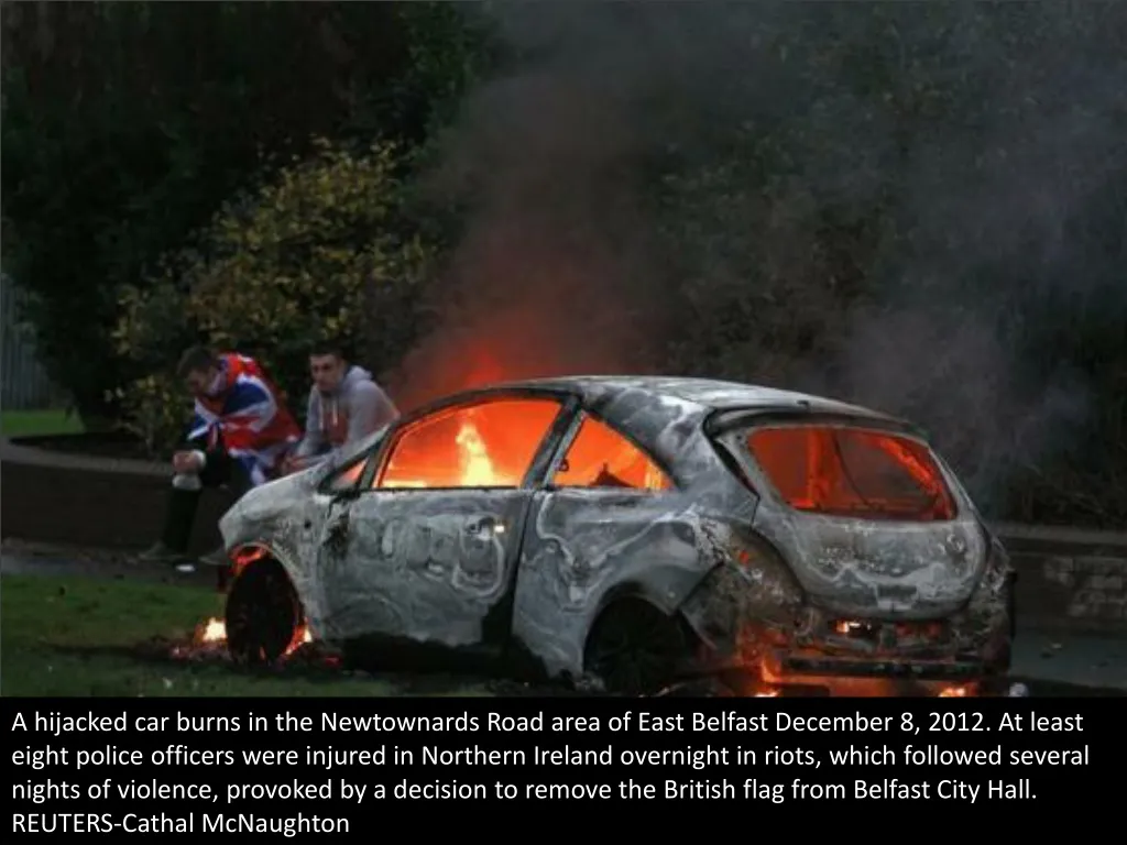 a hijacked car burns in the newtownards road area