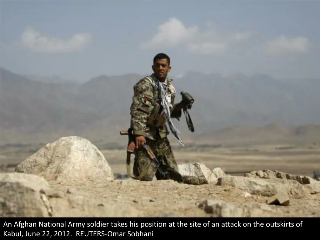 an afghan national army soldier takes