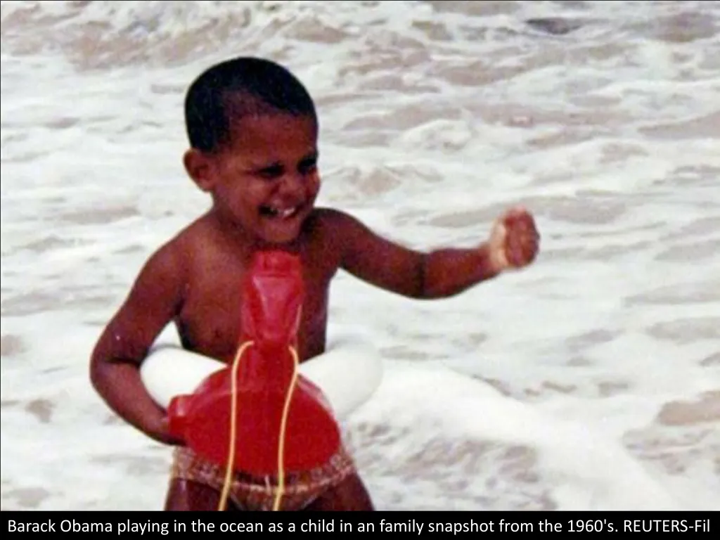 barack obama playing in the ocean as a child