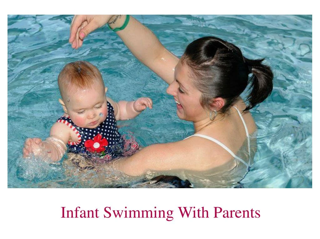 infant swimming with parents