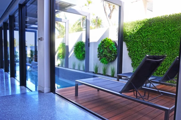 Artificial green walls & vertical gardens and fake hedges