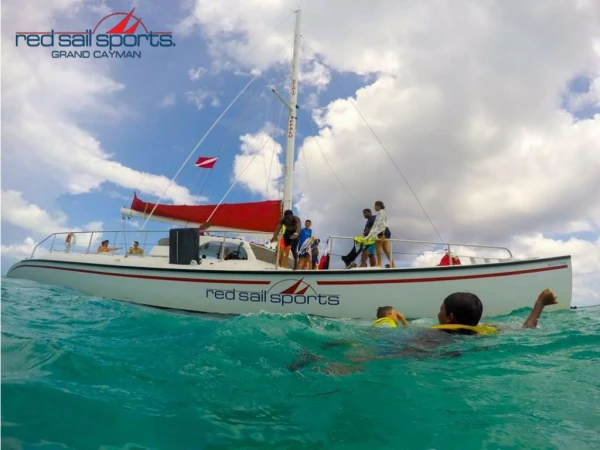 The Catamaran Ferry Service to Enjoy a Caribbean Beach BBQ at Rum Point