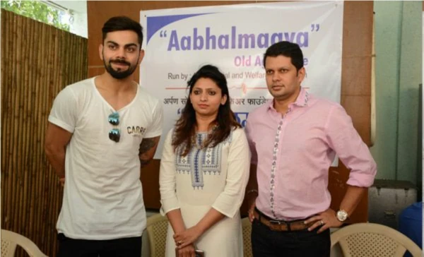 Mr.Amit Bhosale with Mr.Virat Kohli and Dr.Aparna Deshmukh