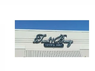 Touch of Bronze Tanning Salon - slide 1