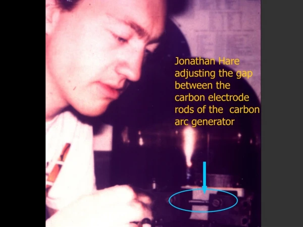 Jonathan Hare adjusting the gap between the carbon electrode rods of the  carbon arc generator