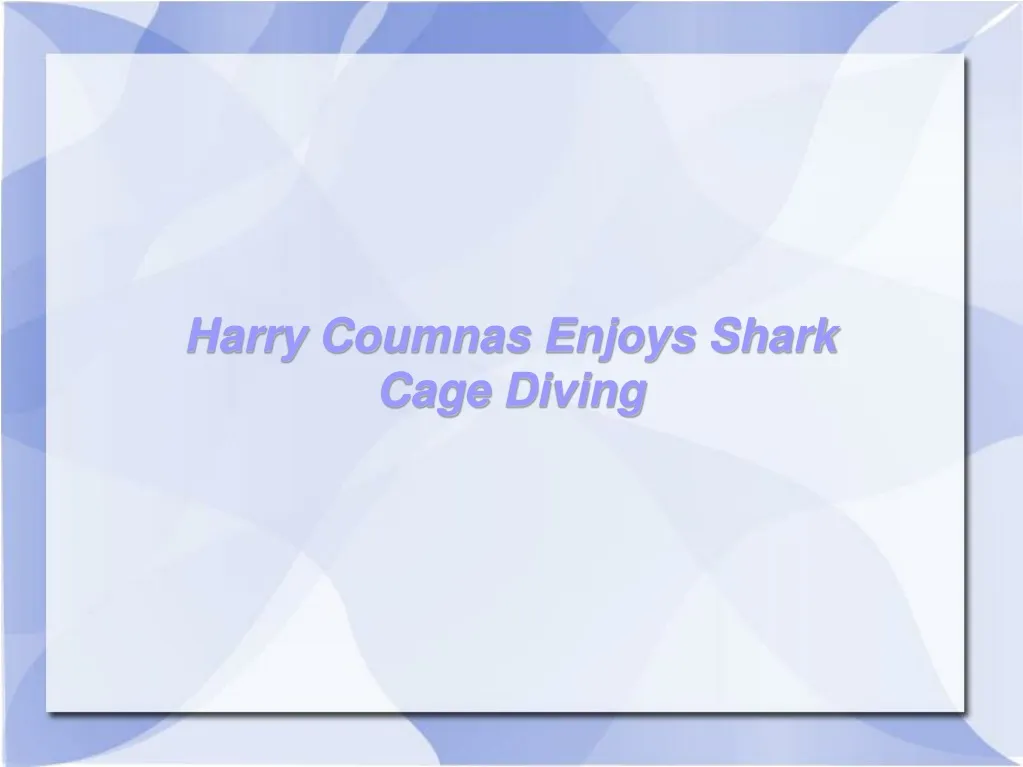 harry coumnas enjoys shark cage diving